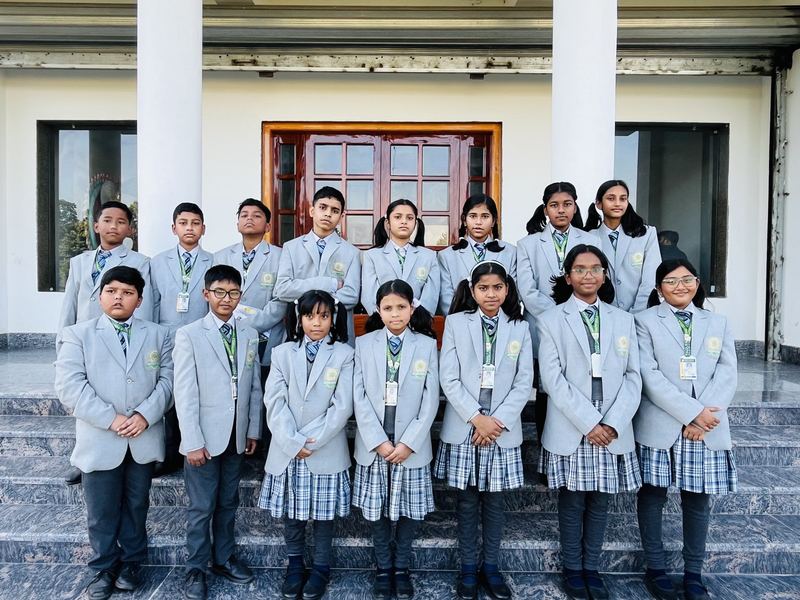 Students in school uniform at the main entrance