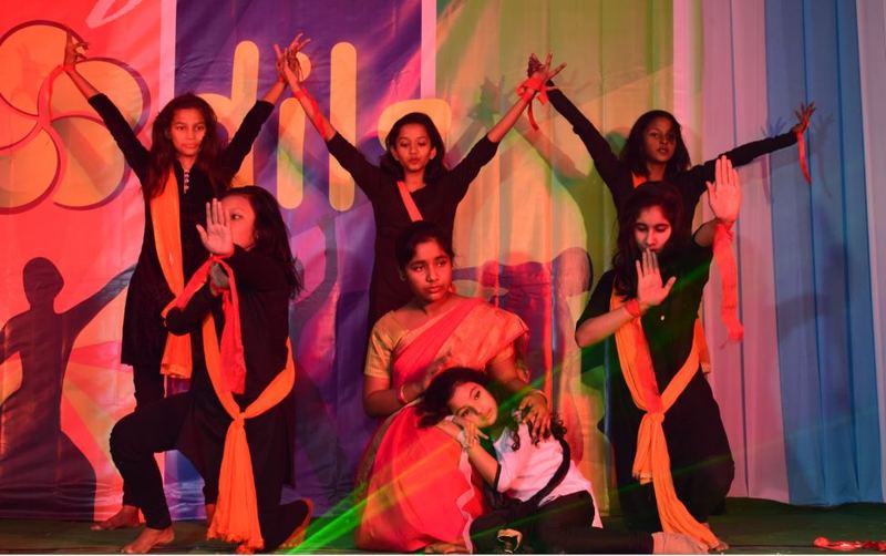 Students performing a group dance at the annual function