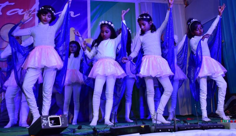 Students in a group dance performance at the annual function